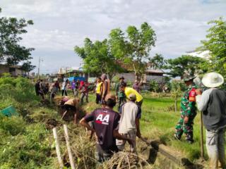 Koramil 1406-02/Tanasitolo Laksanakan Karya Bhakti Pembersihan Talut Bersama Masyarakat